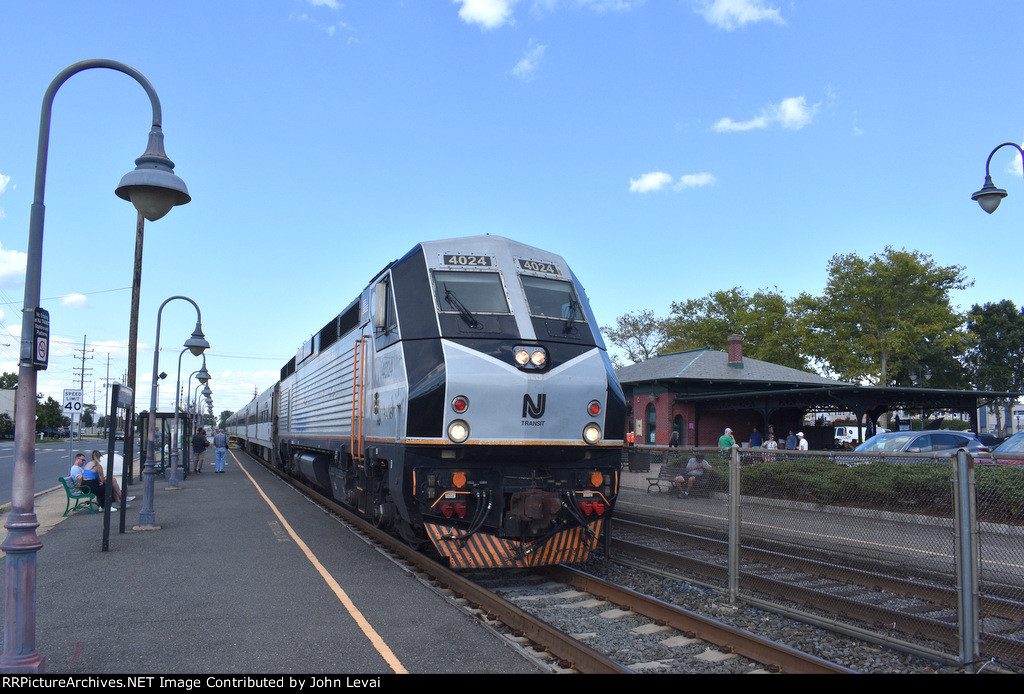 PL42AC # 4024, in charge of NJT Train # 4745, arrives into Bradley Beach Station running about 30 minutes late 